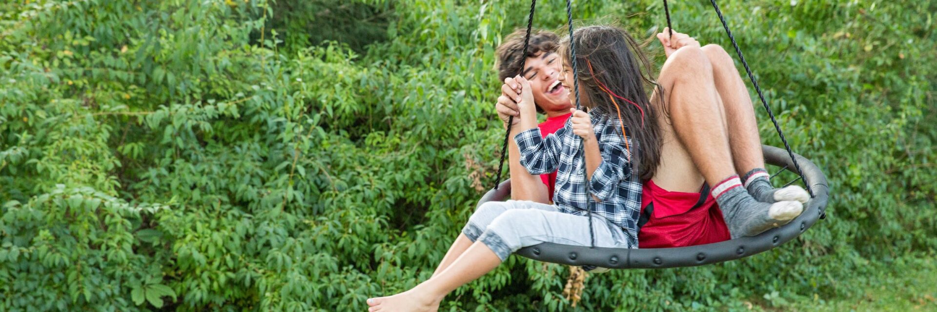 teenagers on swing